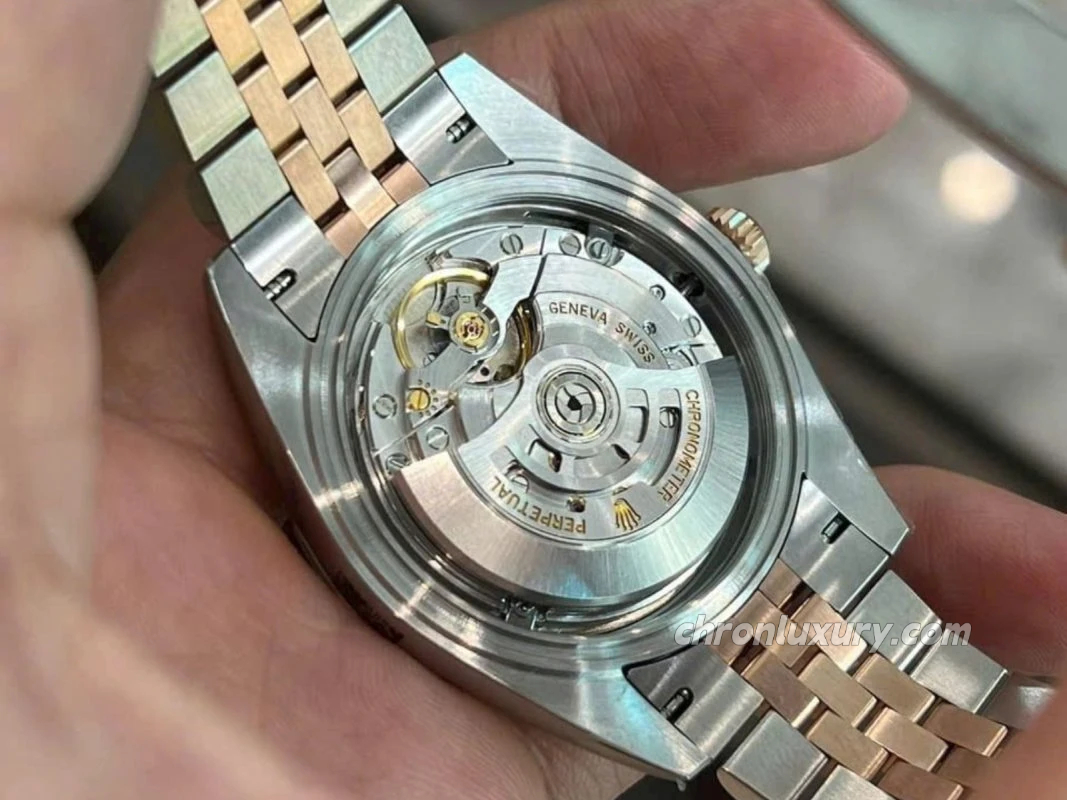 Close-up of a Rolex replica movement showing internal mechanical parts.