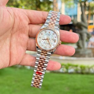 Đồng Hồ Rolex Datejust 126231 Demi Vàng Hồng Độ Mặt Xà Cừ Tự Nhiên Cọc Số Moissanite Dây Jubilee Replica 1:1 VSF 36mm