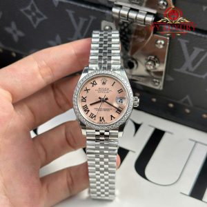 Đồng Hồ Nữ Rolex Datejust 278384RBR Mặt Hồng Cọc Số La Mã Viền Đá Dây Jubilee Replica 1:1 THB 31mm
