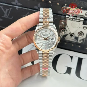 Đồng Hồ Rolex Datejust 126231 Demi Vàng Hồng Mặt Lá Cọ Bạc Cọc Số Dạ Quang Dây Jubilee Replica 1:1 VSF 36mm