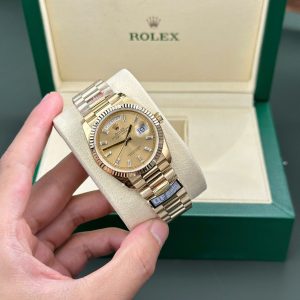 Đồng Hồ Rolex Day-Date 128238-0132 Mặt Số Vàng Champagne Cọc Số Baguette 158g Rep 1:1 QF 36mm