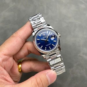 Đồng Hồ Rolex Day-Date 128239-0069 Mặt Số Màu Xanh Dương Cọc Số Đá Baguette 158g Rep 1:1 QF 36mm