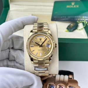 Đồng Hồ Rolex Day-Date 228238-0005 Vàng Vàng Mặt Vàng Champagne Cọc Số Đá Baguette 184g Rep 1:1 QF 40mm