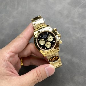 Đồng hồ Rolex Daytona 126508-0002 Vàng Kim Mặt Đen Vàng Rep 1:1 Tinh Chỉnh Cân Nặng 180g QF 40mm